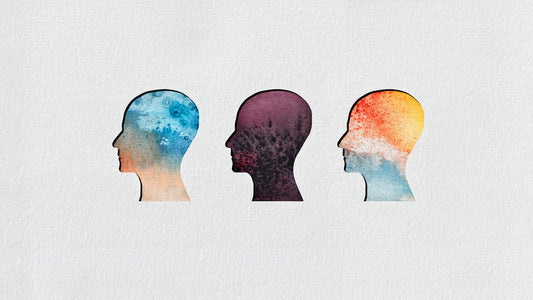 Three watercolor illustrated human head silhouettes with colorful brain imagery, representing different thought patterns in new motherhood
